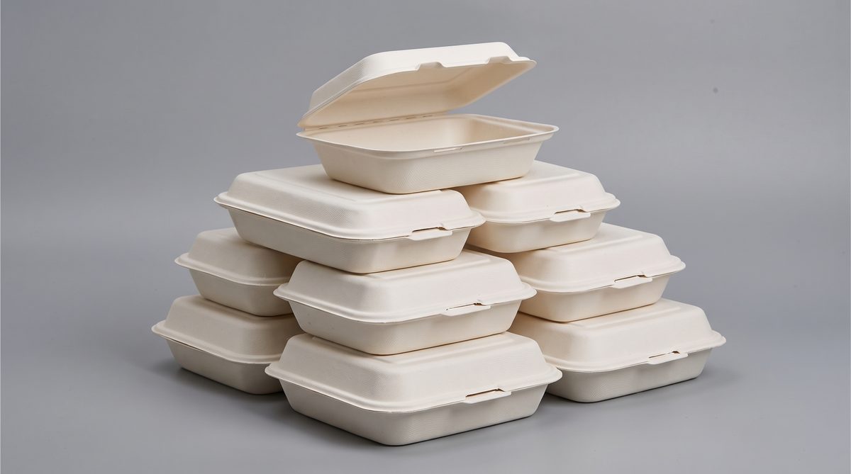 Stack of bagasse hinged containers for takeaway