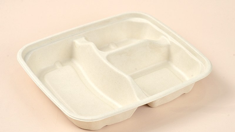 Molded fiber food container that is both packaging and a food-contact article