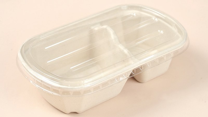 Molded fiber food container packed for a delivered shipment with documents